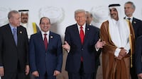 US President Donald Trump with world leaders at a summit on ending the Israel-Gaza war, at the Egyptian resort of Sharm El Sheikh. Getty Images