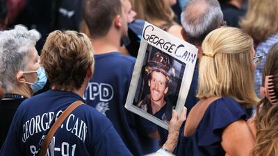 Families of the victims of the 9/11 terror attacks attend the annual Commemoration Ceremony at the National 9/11 Memorial and Museum in New York City. Getty Images