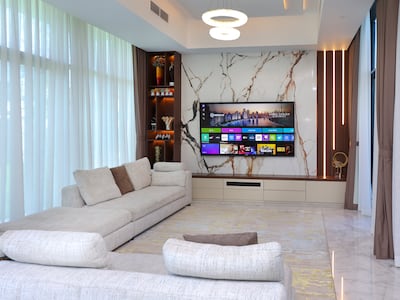 There is one TV in the house, on the ground floor. Victor Besa / The National