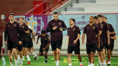 Niklas Suele warms up with teammates. Getty