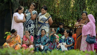 Indian women gather outside the residence of Bollywood actress Sridevi . Many have travelled hundreds of kilometres to catch a glimpse of the actress before she is buried. Punit Paranjpe / AFP Photo