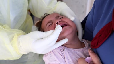 Palestinian medical staff collecting swab samples for Covid-19 testing in the coronavirus section of Dhahria hospital. EPA