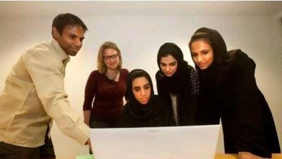 From left, MindTalk's Satheesh Kumar, Christiane Schloderer, Azza AlNuaimi, Meerah Ketait and Sarah Al Qassimi during a meeting at their office in Deira last week.