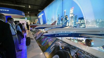 Scale models of Boeing commercial aircraft on display at the Singapore Airshow. Roslan Rahman / AFP