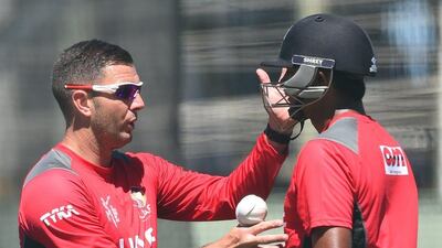 Paul Franks speaks with Amjad Javed. (AFP)