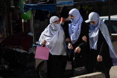 Shops have reopened, and the streets are busy with cars and pedestrians. Hasan Belal for The National