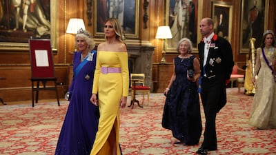 The queen, Ms Trump, National Grid chairwoman Paula Reynolds, Prince William and his wife Catherine attend the banquet. Getty Images