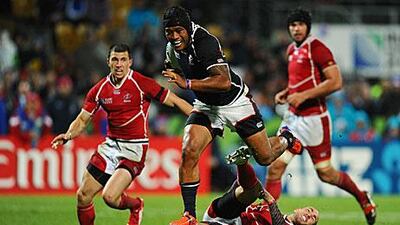 The US centre Andrew Suniula blasts through a brittle Russian defence during his side's 13-6 victory in Pool C of the Rugby World Cup.