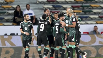 UAE players celebrate their opening goal during their 3-2 win over Kyrgyzstan in the second round of the Asian Cup. All photos by Pawan Singh / The National