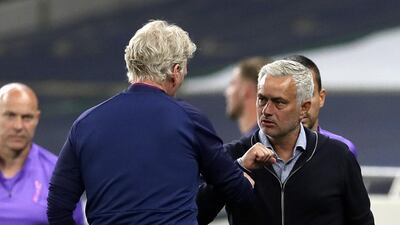 Tottenham manager Jose Mourinho (R) and West Ham's David Moyes after the match. EPA