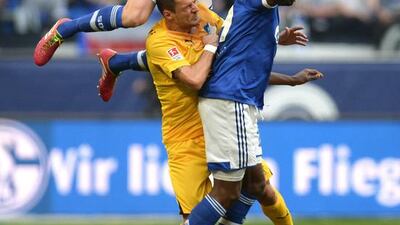 Schalke’s Nigerian forward Chinedu Obasi, Schalke’s defender Benedikt Hoewedes (top) and Hoffenheim’s Bosnian midfielder Sejad Salihovic, left, vie for the ball during the German first division Bundesliga football match FC Schalke 04 vs TSG Hoffenheim in Gelsenkirchen, western Germany. Patrick Stollarz / AFP