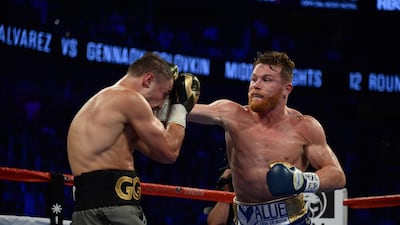 Gennady Golovkin, left, blocks a shot from Saul 'Canelo' Alvarez during the world middleweight boxing championship at T-Mobile Arena in Las Vegas. The bout ended in a draw. Joe Camporeale / USA Today