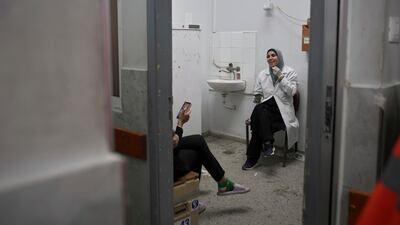 Emergency ward nurses take a break in a room after treating a large number of injuries