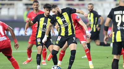 Karim Benzema scores Al Ittihad's opening goal. EPA