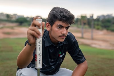 Mohammad Safa, 16, eyes a putt at the Golf Club of Lebanon, where he has practised for the past five years. Matt Kynaston / The National
