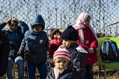 Orphans gather at the Kurdish-run Al Hol camp, home to thousands of relatives of ISIS fighters. AFP