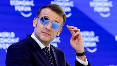 French President Emmanuel Macron got everyone talking with his bright mirrored sunglasses at Davos. Reuters