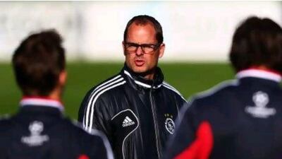 Frank de Boer, the Ajax manager, and his team could knock Manchester City out of the Champions League when they visit Etihad Stadium tonight. Dean Mouhtaropoulos / Getty Images