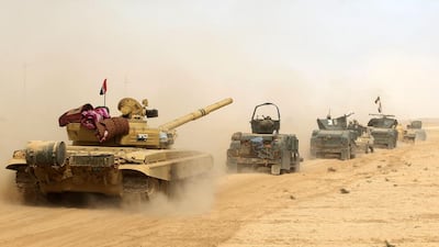 Iraqi forces deploy in Al Shurah, some 45 kilometres south of Mosul, on October 17, 2016, as they advance towards the city to retake it from ISIL. Ahmad Al Rubaye/AFP