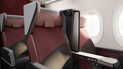 Premium economy class features larger dividers between seats