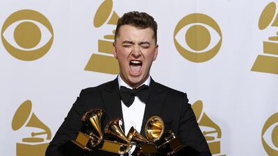 Sam Smith poses with his Grammy awards. (Mike Blake / Reuters)
