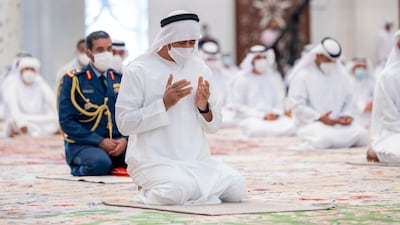 Sheikh Mohamed bin Zayed attends Eid Al Fitr prayers at the Sheikh Zayed Grand Mosque. Hamad Al Kaabi / Ministry of Presidential Affairs