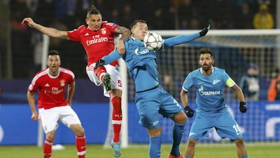 Zenit St Petersburg’s Artem Dzyuba in action against Benfica’s Ljubomir Fejsa. REUTERS/Maxim Zmeyev