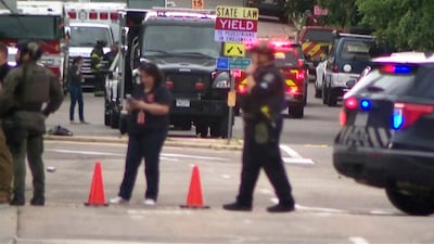 Police gather at the scene. Reuters