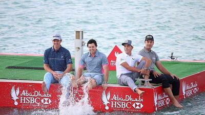 From left, Justin Rose of England, Rory McIlroy of Northern Ireland, Rickie Fowler of the USA and Henrik Stenson of Sweden during a photocall at the Abu Dhabi Golf Cub. Andrew Redington / Getty Images