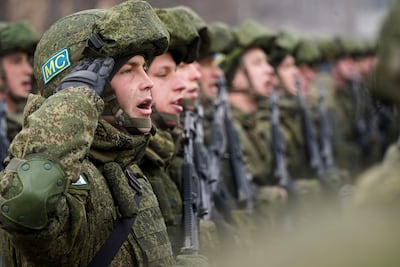 Russian peacekeepers of the Collective Security Treaty Organisation attend the official ceremony of starting withdraw its troops in Almaty, Kazakhstan. AP