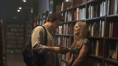 Ben Affleck and Rosamund Pike in the movie Gone Girl, based on the best-selling novel. Courtesy 20th Century Fox / AP Photo
