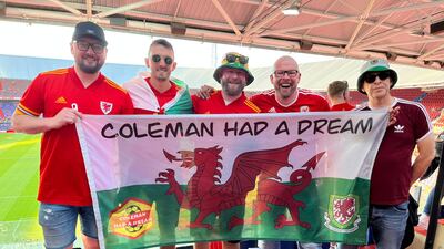 Wales fan Dai Rees (C), with fellow supporters, is looking forward to the World Cup finals. Photo: Dai Rees