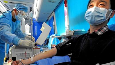 A man who has recovered from Covid-19 donates plasma in Lianyungang in China's eastern Jiangsu province on February 16. AFP