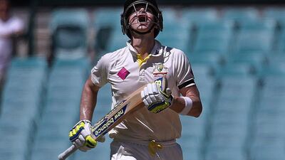 Australia's captain Steven Smith celebrates reaching his century during Day 2 of the fourth and final Test against India on Wednesday. David Gray / Reuters / January 7, 2015
