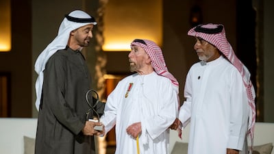Sheikh Mohamed presents an Abu Dhabi Award to Obaid bin Kanish Al Hamli