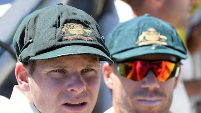 Australia's cricket establishment was mired in a crisis this year after Steve Smith, left, David Warner, right, and Cameron Bancroft admitted to being involved in a ball-tampering episode during the Cape Town Test against South Africa. The trio was suspended and some of Cricket Australia's top office-bearers resigned. Justin Langer was appointed coach in place of Darren Lehmann, and it was decided that the team had to weed out their hyper-competitiveness and a win-at-all-cost mentality that had made them successful but unlikeable. It also meant having a relook at sledging. Dave Hunt / EPA