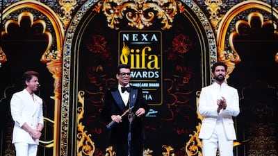 Karan Johar, centre, being honoured for completing 25 years in the Hindi film industry