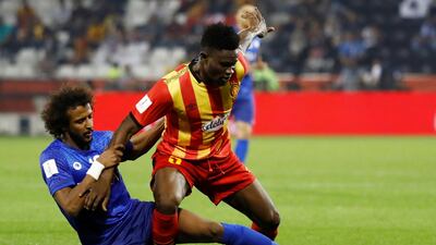 Al Hilal's Yasser Alshahrani in action with Esperance Sportive de Tunis' Kwame Bonsu during their Fifa Club World Cup match. Reuters