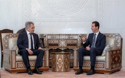 A handout photo from the state-run SANA agency shows Syrian President Bashar Assad meeting with the Russian Defence Minister Sergey Shoygu in Damascus on March 19, 2019. EPA