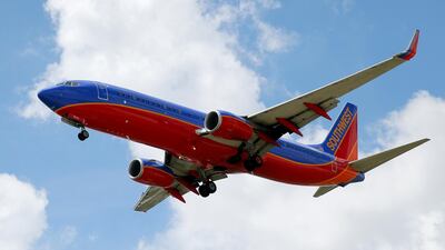 A Southwest Airlines jet makes its approach to Dallas Love Field airport. Tony Gutierrez/AP