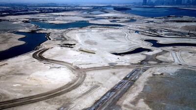 Above, an aerial view of the site where Emaar Properties plans to build an even taller tower than the Burj Khalifa. Marwan Naamani / AFP