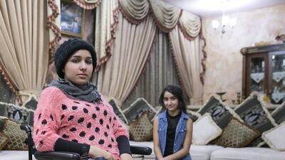 Sara, 18, and Shahed, 12, who suffer from Friedreich’s ataxia, which killed their brother Mahmoud. Silvia Razgova / The National