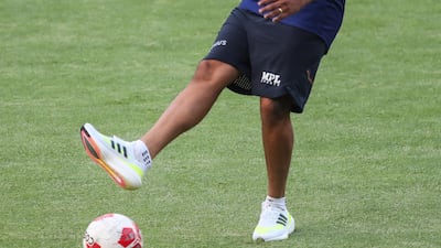 India batsman Rohit Sharma playing football at training. AP