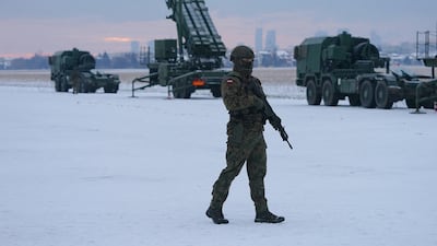 A soldier in front of a Patriot surface-to-air missile system during a military exercise at Warsaw-Babice Airport, Poland, in February. AFP