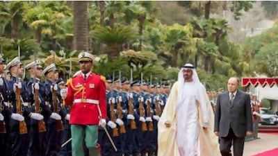 General Sheikh Mohamed bin Zayed Al Nahyan, Crown Prince of Abu Dhabi and Deputy Supreme Commander of the UAE Armed Forces (2nd right), inspects the honour gaurd with Abdelaziz Bouteflika, President of Algeria (right), at the Presidential palace while in Algiers for an official visit.. Courtesy Ryan Carter, Crown Prince Court