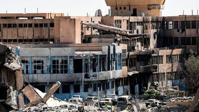 The central hospital in Raqqa, where the battle to drive out ISIL has destroyed much of the northern Syrian city's infrastructure. As Syrian Democratic Forces seek out the extremists' last hideouts, the city council-in-exile is already working to bring life back to its devastated home town. Bulent Kilic / AFP