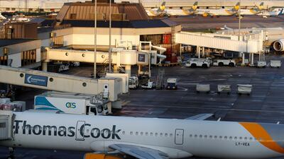 A grounded airplane with the Thomas Cook livery is seen at Manchester Airport, Manchester, Britain. Reuters