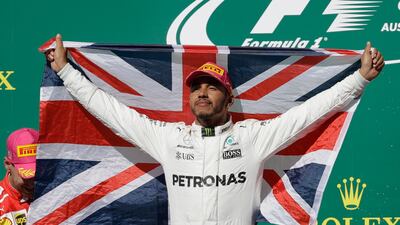 Lewis Hamilton celebrates after winning the Formula One U.S. Grand Prix. (AP Photo/Eric Gay)