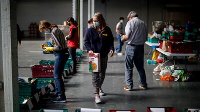Households most reliant on Covid support measures like food banks are at greatest risk of poorer Covid recovery outcomes. AFP