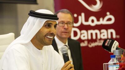 Abu Dhabi Racing managing director Khaled Al Qubaisi announces the academy with Daman executive Sven Rohte. Christopher Pike / The National